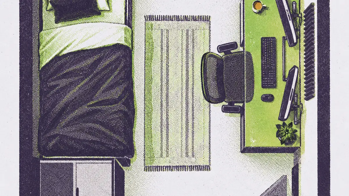 Petite chambre avec lit, bureau contre le mur, clavier compact et micro sur bras articulé